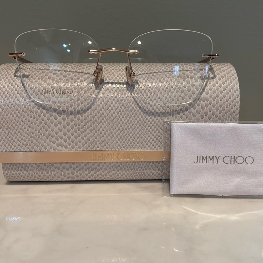 Jimmy choo jc363 eyeglass frames 
Rimless rose gold